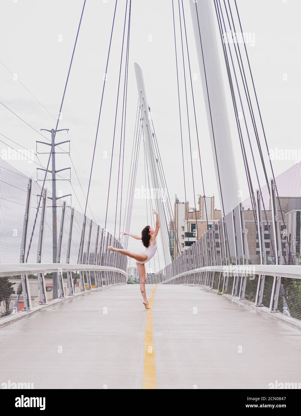 Ballerina on Suspension Bridge Stock Photo - Alamy