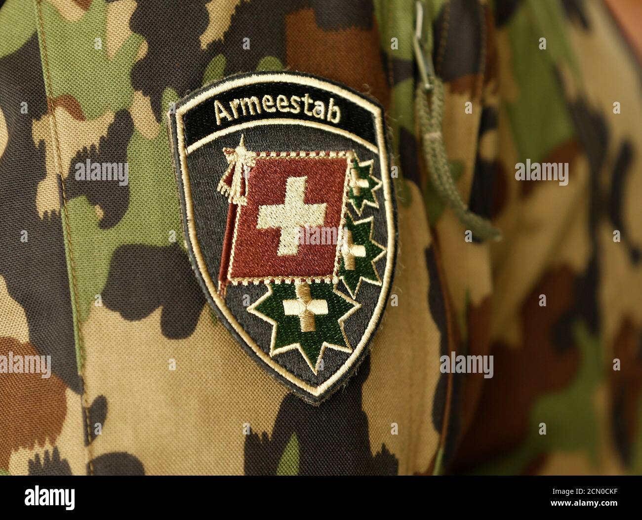 The coat of arms of the Armed Forces Staff is pictured on Philippe Rebord,  Chief of Armed Forces of Swiss army during a presentation of the Swiss Air  Police Service 24 (LP24)