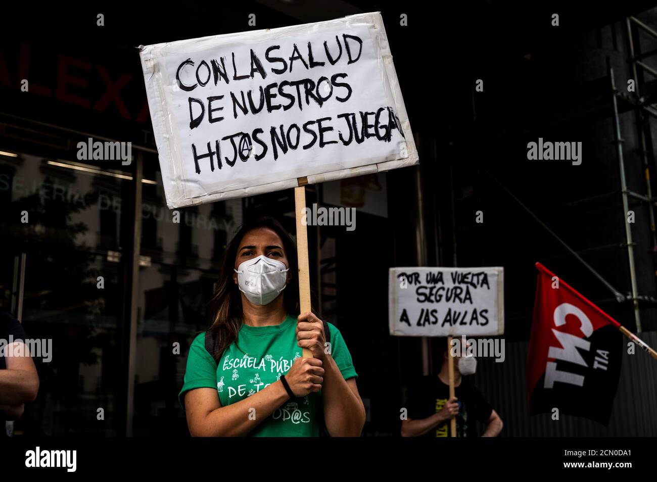 Madrid, Spain. 17th Sep, 2020. A protester holds a placard reading 'You do not play with the health of our children' as teachers and students demonstrate demanding safety measures against coronavirus in schools and universities while COVID-19 cases keep rising in Spain. Teachers and students are on strike in education in the community of Madrid. Credit: Marcos del Mazo/Alamy Live News Stock Photo