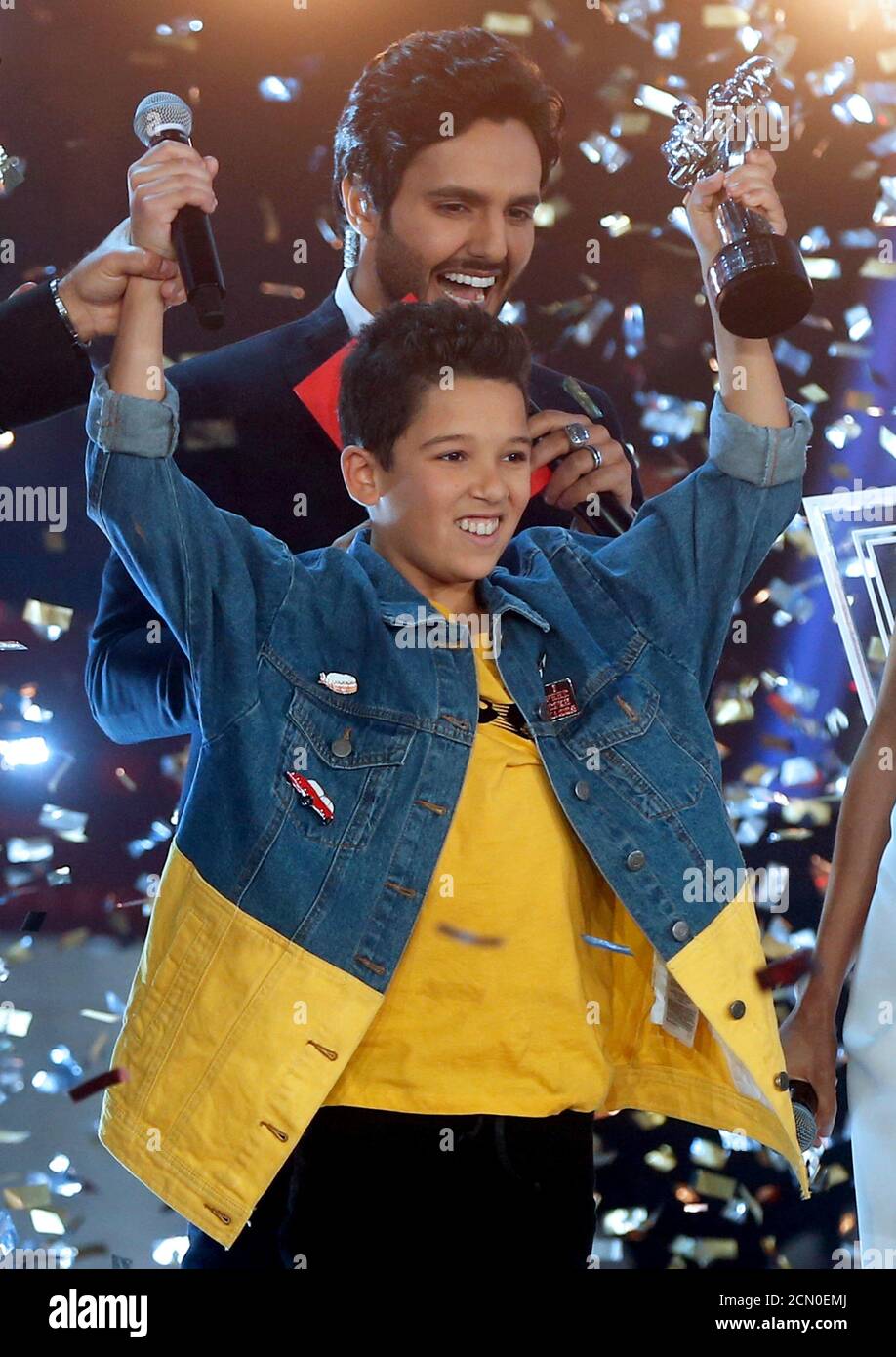 Hamza Labyad celebrates during the final of 'The Voice Kids' singing competition in Beirut, Lebanon February 3, 2018. REUTERS/Mohamed Azakir Stock Photo