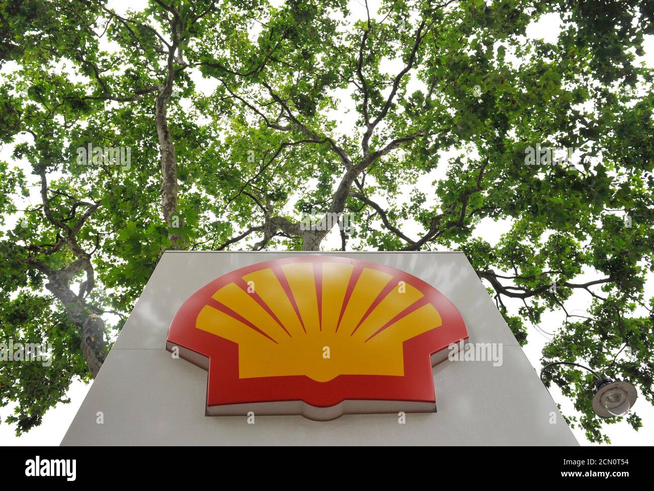 A Logo Is Seen Under A Canopy Of Trees At A Shell Petrol Station In Central London July 29 2010 Royal Dutch Shell Plc Said Second Quarter Profits Doubled Thanks To High Oil
