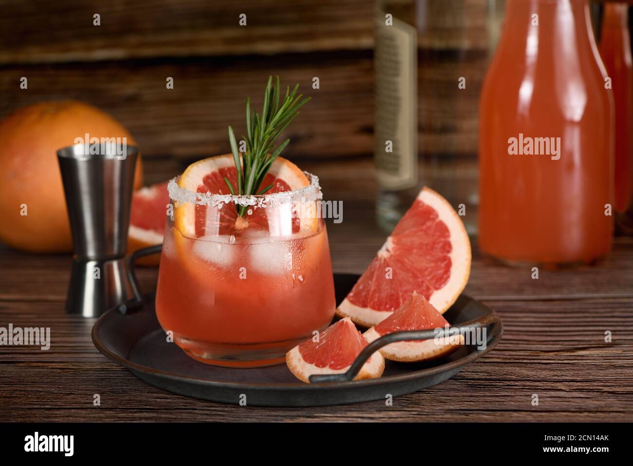 Cocktail tequila fresh grapefruit juice combined and rosemary. A festive drink is ideal for brunch, Stock Photo