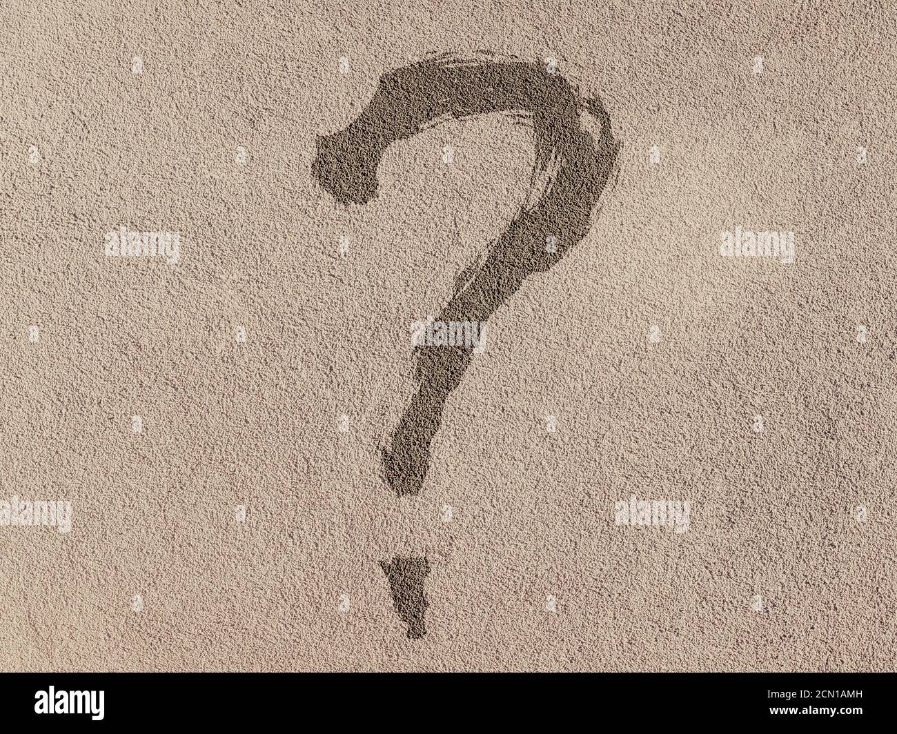 Question mark on a cement wall. Close-up. Background texture Stock Photo