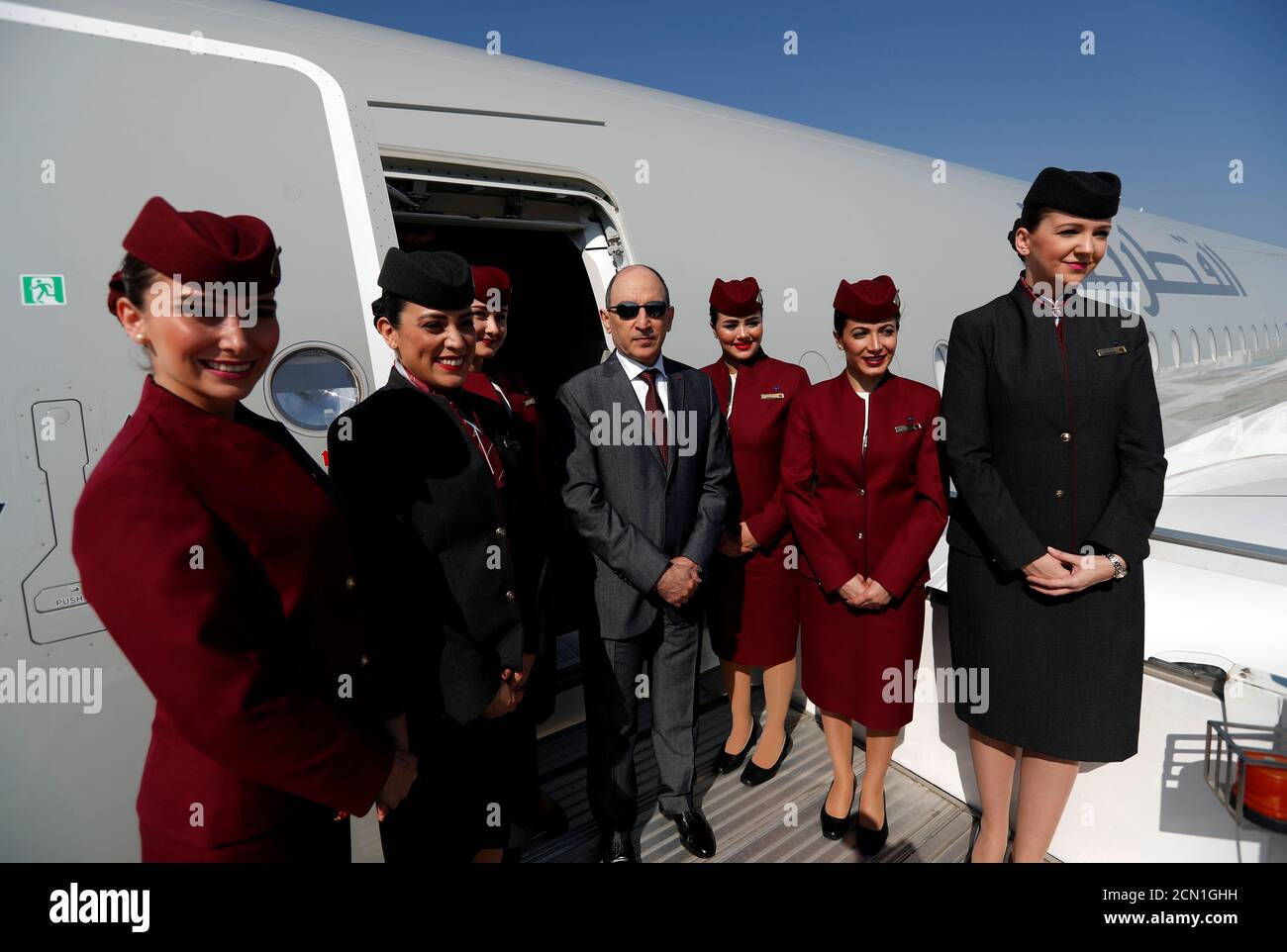 Qatar airlines cabin crew hi-res stock photography and images - Alamy
