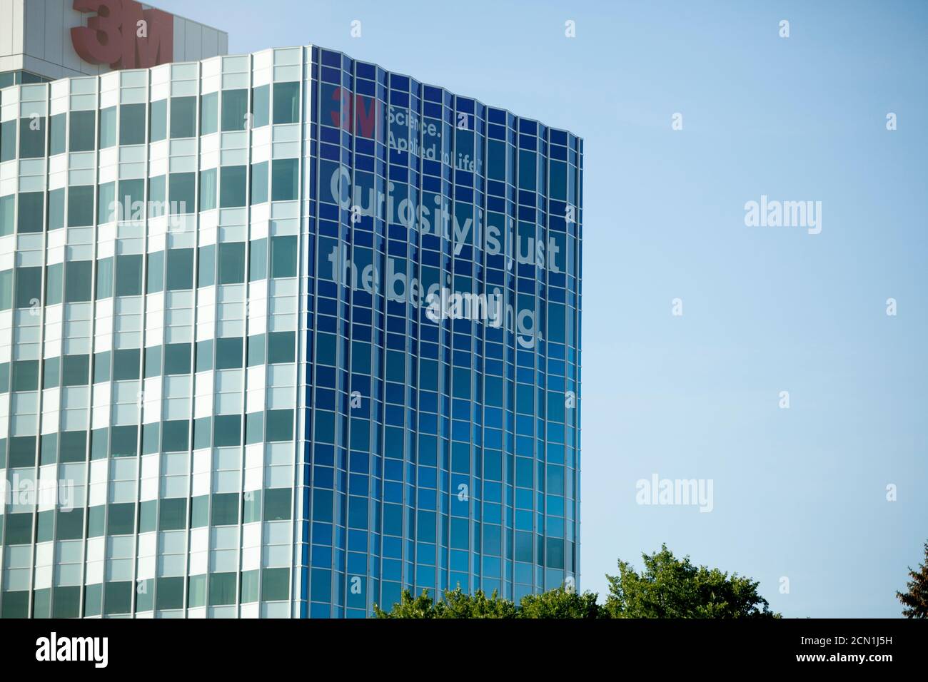 3M office building with a saying stating on the building 'Curiosity is Just the Beginning'. St Paul Minnesota MN USA Stock Photo