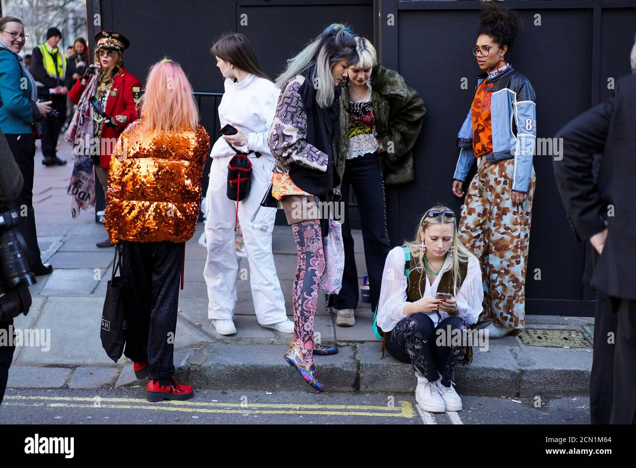 Fashionistas gather outside the BFC Showspace during London Fashion Week Women's A/W19 in London, Britain February 15, 2019. REUTERS/Henry Nicholls Stock Photo
