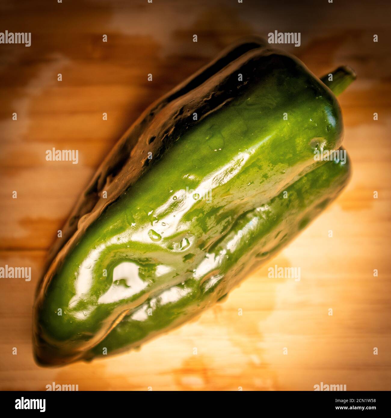 Detail of green pepper with small water droplets Stock Photo