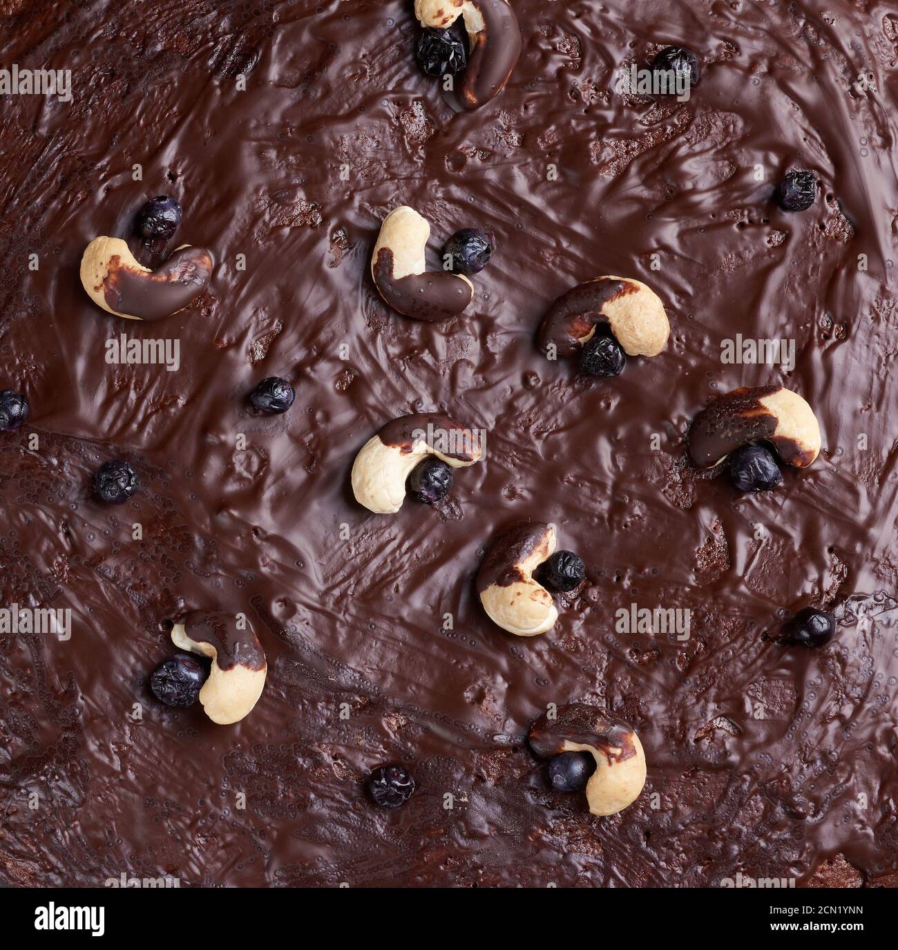 texture of baked brownie chocolate cake with chocolate poured. Cooked homemade food. Chocolate pastr Stock Photo