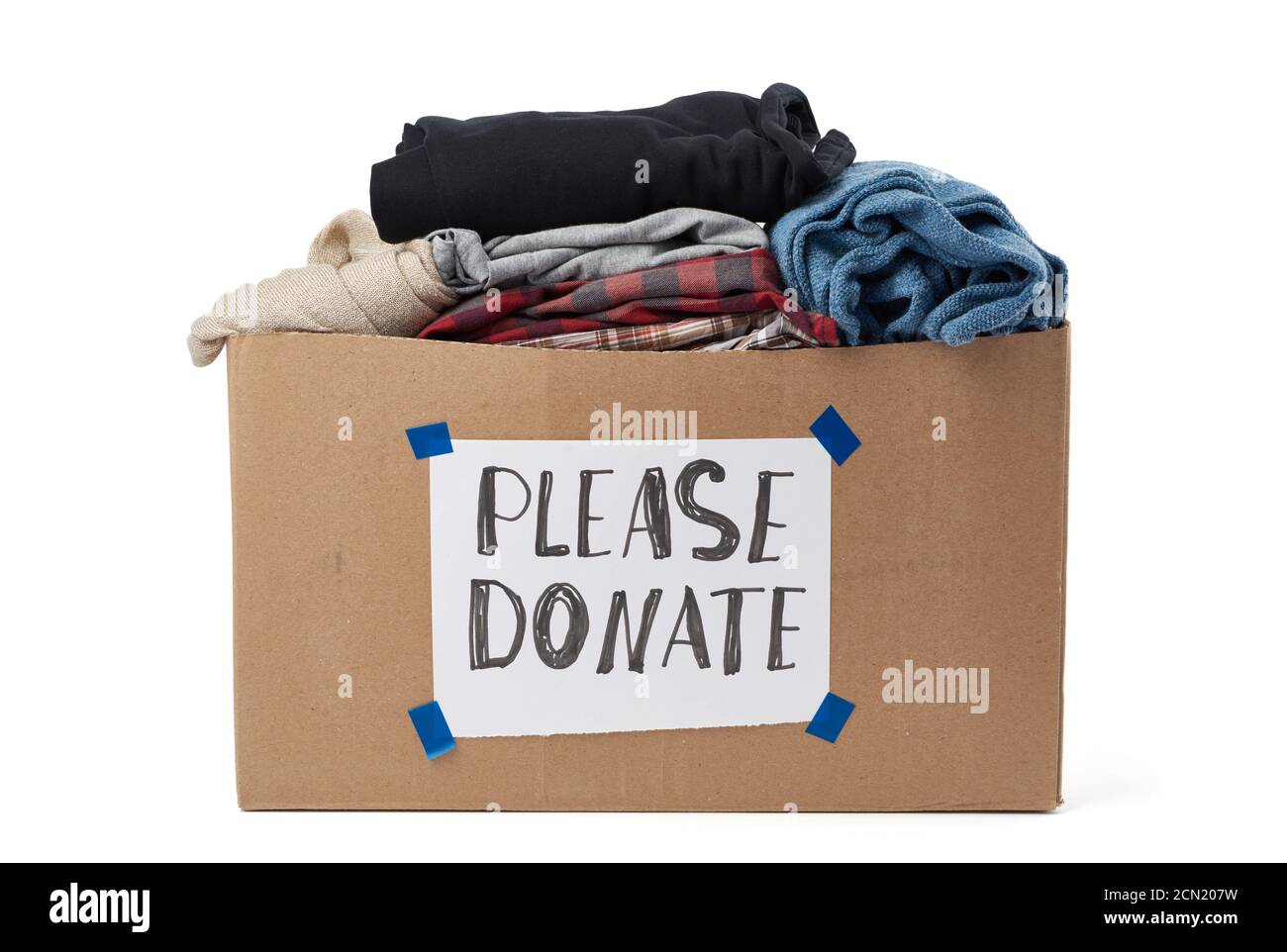 large brown cardboard box with the inscription please donate Stock