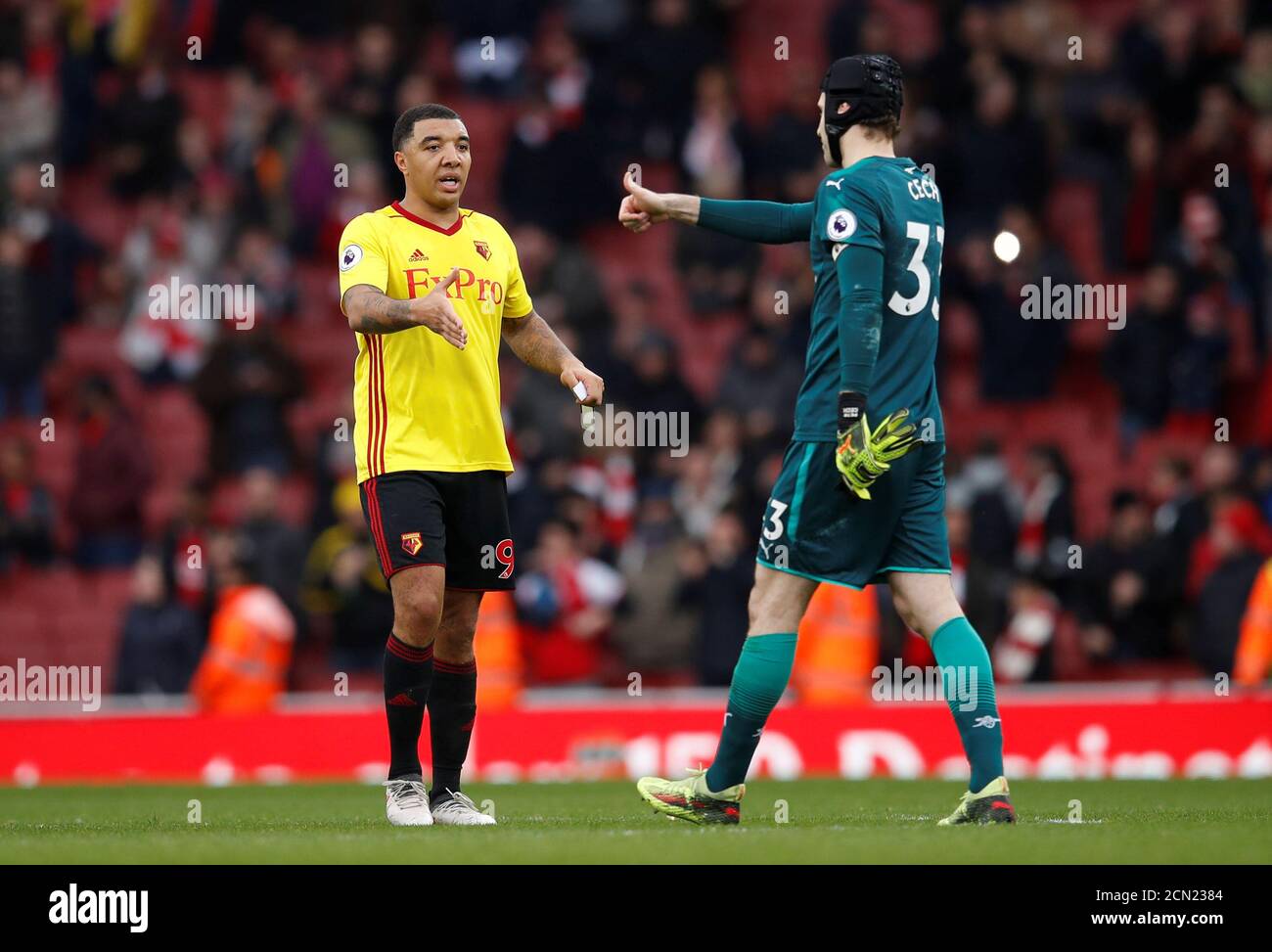 Soccer Football - Premier League - Arsenal vs Watford - Emirates Stadium, London, Britain - March 11, 2018   Watford's Troy Deeney and Arsenal's Petr Cech at the end of the match   REUTERS/Eddie Keogh    EDITORIAL USE ONLY. No use with unauthorized audio, video, data, fixture lists, club/league logos or 'live' services. Online in-match use limited to 75 images, no video emulation. No use in betting, games or single club/league/player publications.  Please contact your account representative for further details. Stock Photo