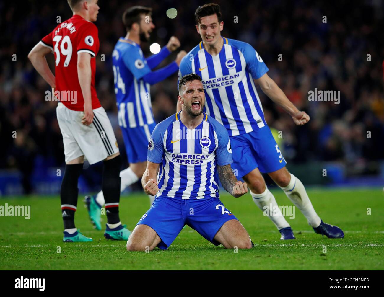 Soccer Football - Premier League - Brighton & Hove Albion v Manchester United - The American Express Community Stadium, Brighton, Britain - May 4, 2018   Brighton's Shane Duffy celebrates after the match with Lewis Dunk   REUTERS/Eddie Keogh    EDITORIAL USE ONLY. No use with unauthorized audio, video, data, fixture lists, club/league logos or 'live' services. Online in-match use limited to 75 images, no video emulation. No use in betting, games or single club/league/player publications.  Please contact your account representative for further details. Stock Photo