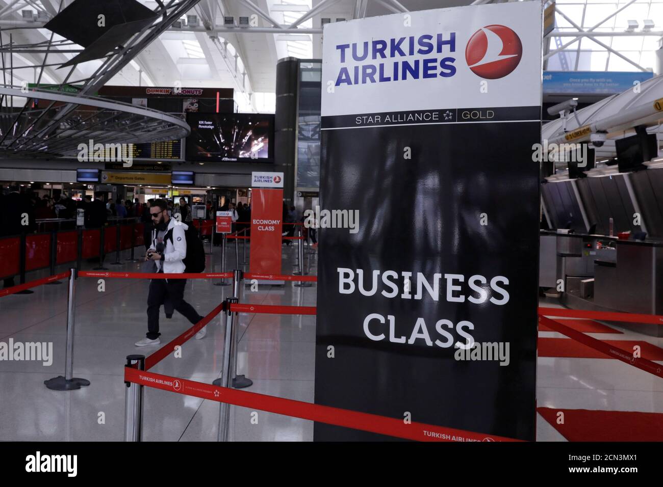 A sign for Turkish Airlines stands near the counters inside of JFK