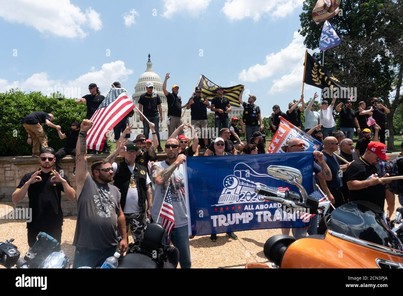 Members of the Proud Boys and a motorcycle group pose for a photo in front of the US Capitol building in Washington DC on 4th July, 2020. Stock Photo