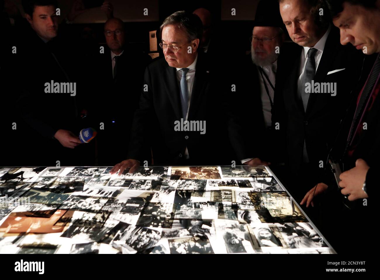 German politician Armin Laschet, Minister-President of Nordrhein-Westphalen, looks a pictures as he views an exhibition during his visit at Yad Vashem World Holocaust Remembrance Center in Jerusalem March 1, 2020. REUTERS/Ronen Zvulun Stock Photo