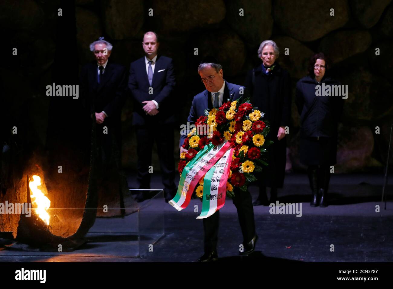 German politician Armin Laschet, Minister-President of Nordrhein-Westphalen, lays a wreath during a ceremony commemorating the six million Jews killed by the Nazis in the Holocaust, in the Hall of Remembrance at Yad Vashem World Holocaust Remembrance Center in Jerusalem March 1, 2020. REUTERS/Ronen Zvulun Stock Photo