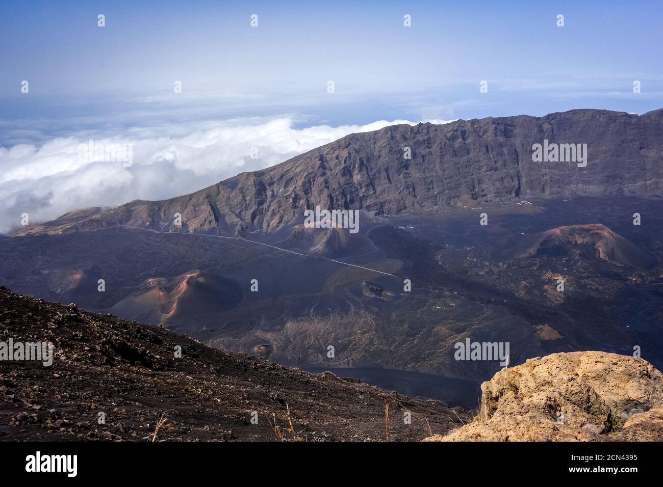 Cha das Caldeiras over the clouds view from Pico do Fogo in Cape Verde ...