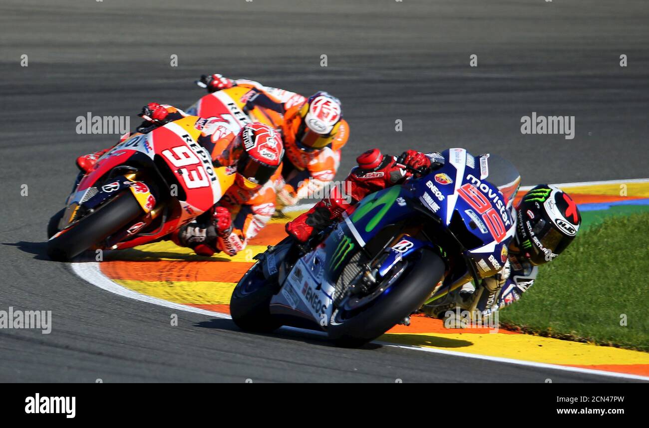 Yamaha Motogp Rider Jorge Lorenzo R Of Spain Races Ahead Of Spanish Honda Riders Marc Marquez 93 And Dani Pedrosa During The Valencia Motorcycle Grand Prix At The Ricardo Tormo Racetrack In
