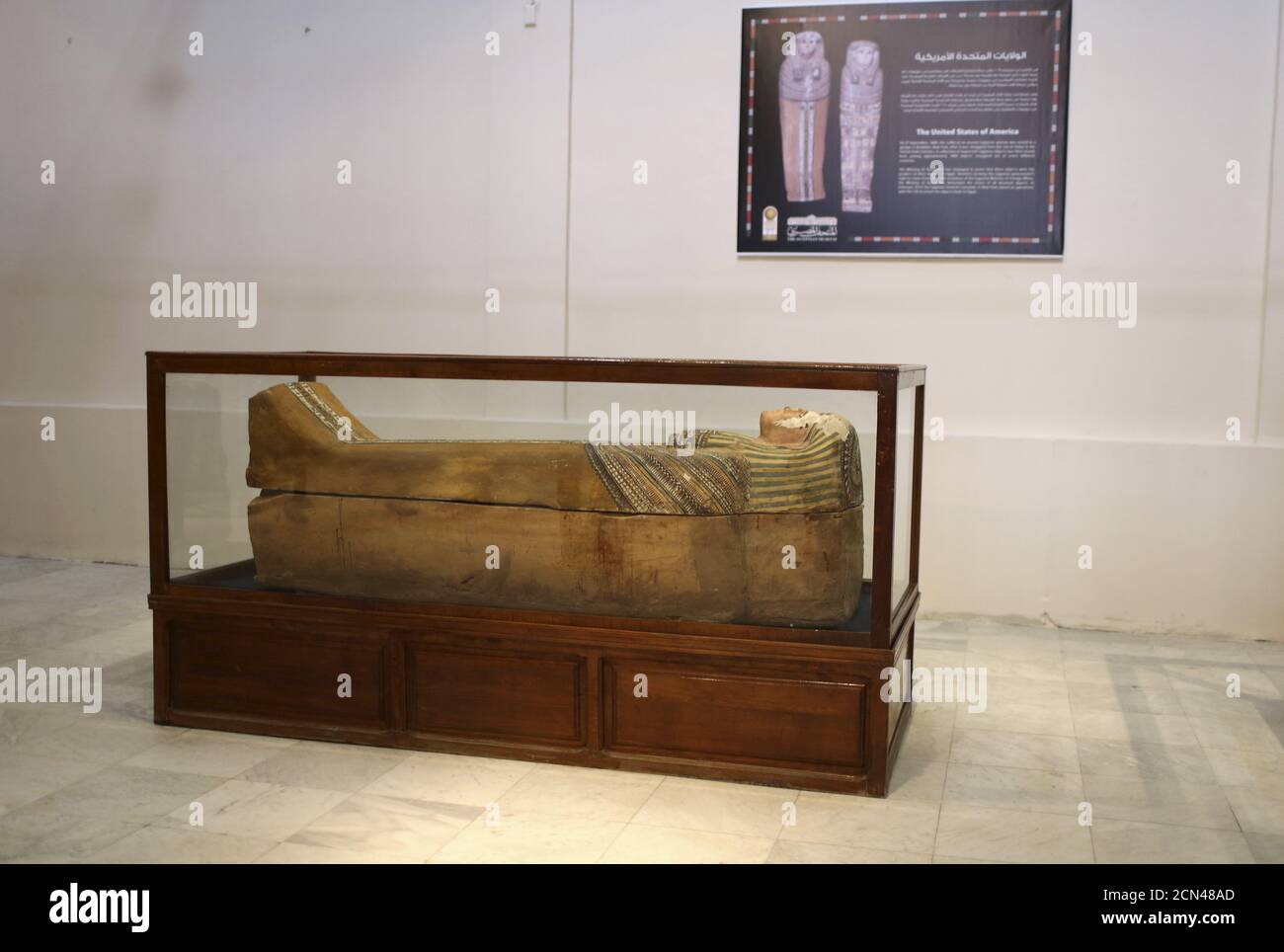 A coffin of an ancient Egyptian woman is displayed at the opening of the  "Repatriated Objects Temporary Exhibition" at the Egyptian museum in Cairo,  January 14, 2016. The exhibition features more than