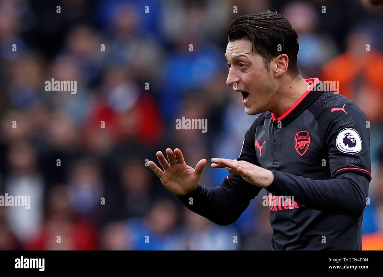 Soccer Football - Premier League - Brighton & Hove Albion vs Arsenal - The American Express Community Stadium, Brighton, Britain - March 4, 2018   Arsenal's Mesut Ozil looks dejected after Brighton's second goal scored by Glenn Murray   REUTERS/Eddie Keogh    EDITORIAL USE ONLY. No use with unauthorized audio, video, data, fixture lists, club/league logos or 'live' services. Online in-match use limited to 75 images, no video emulation. No use in betting, games or single club/league/player publications.  Please contact your account representative for further details. Stock Photo