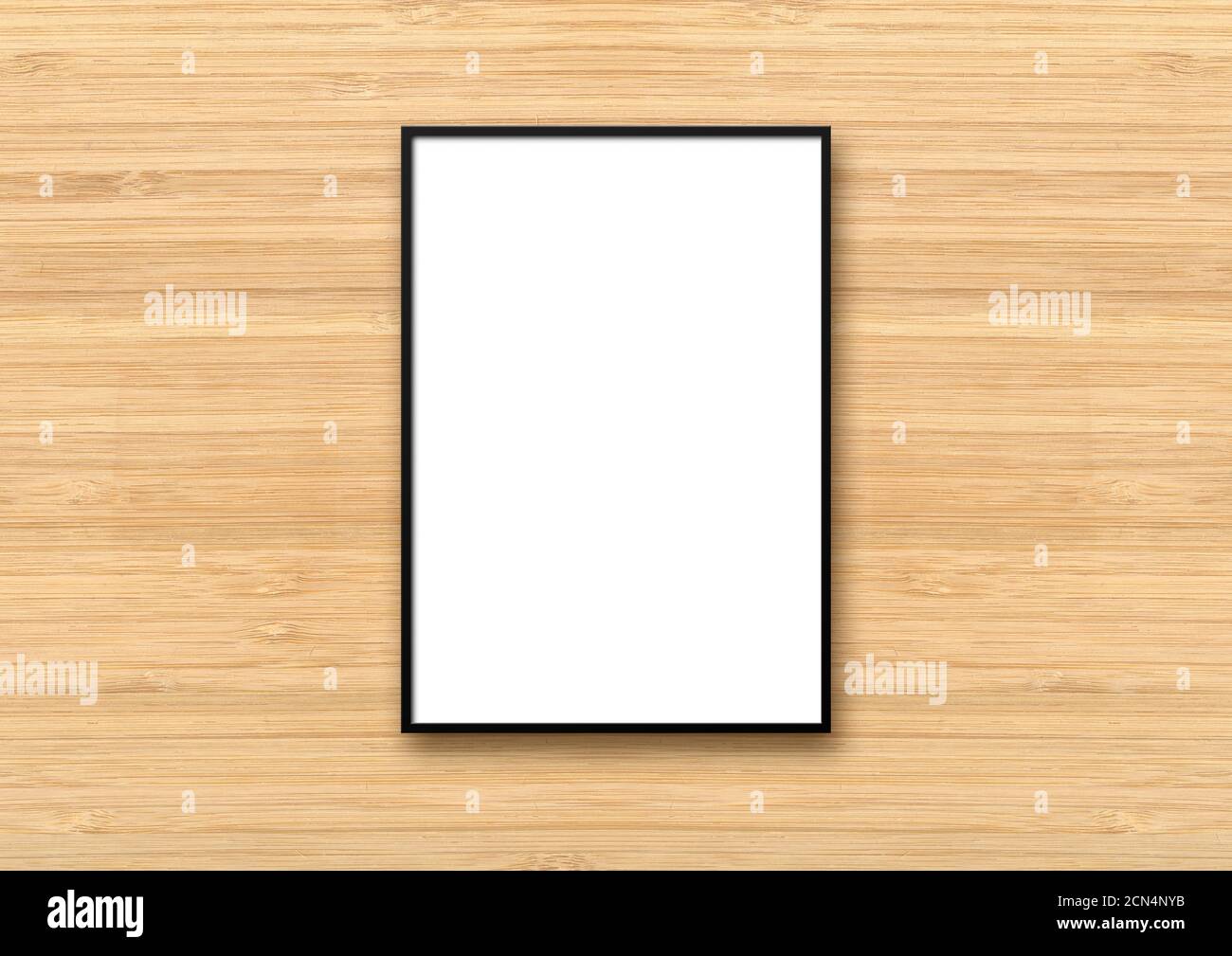 Black picture frame hanging on a light wooden wall Stock Photo - Alamy
