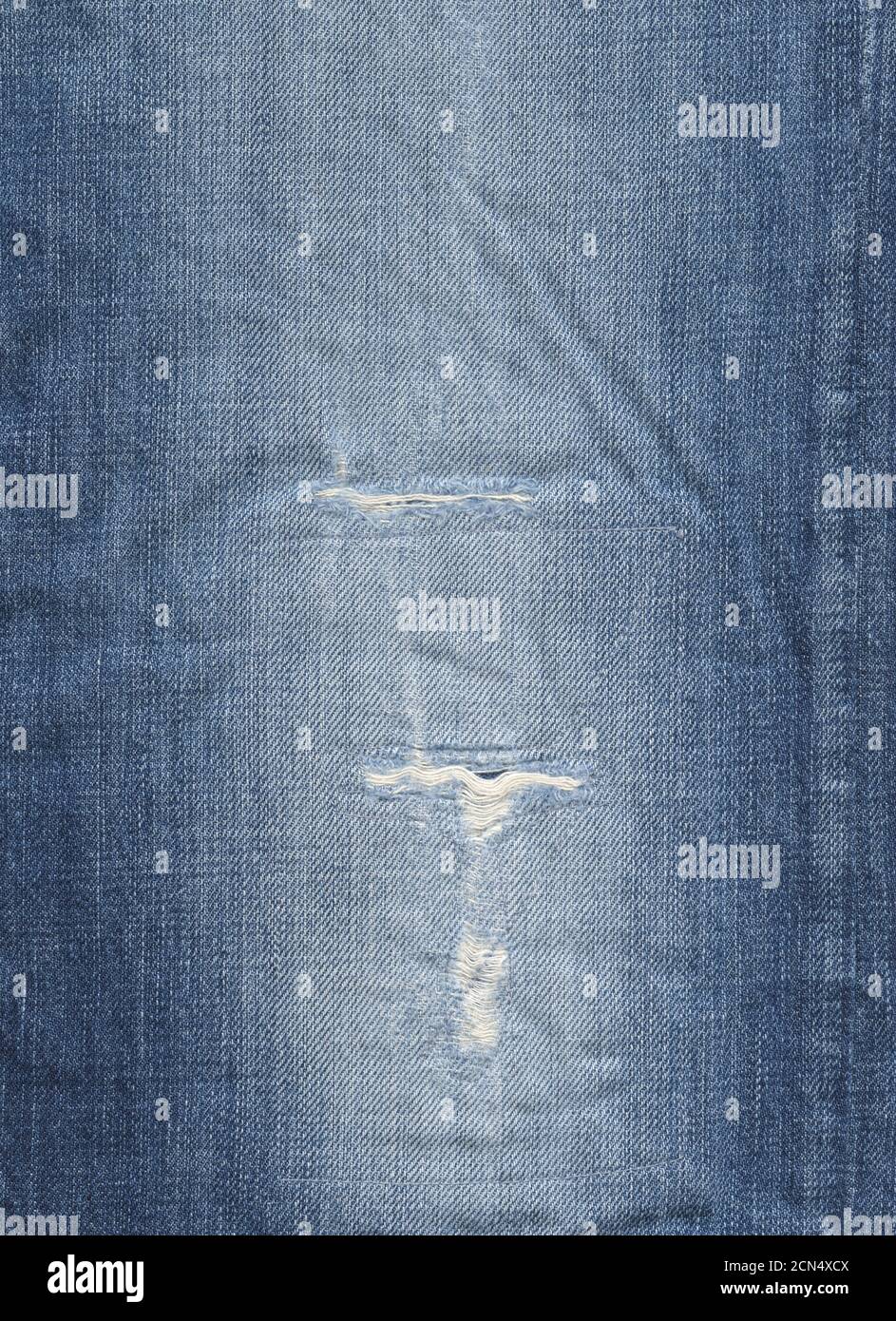 Old used blue denim texture background Stock Photo
