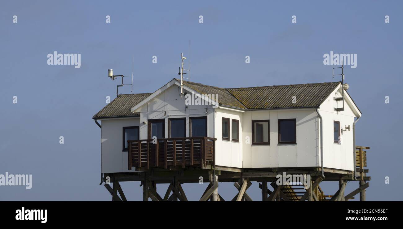 Stilt houses at the beach of St. Peter Ording Stock Photo Alamy