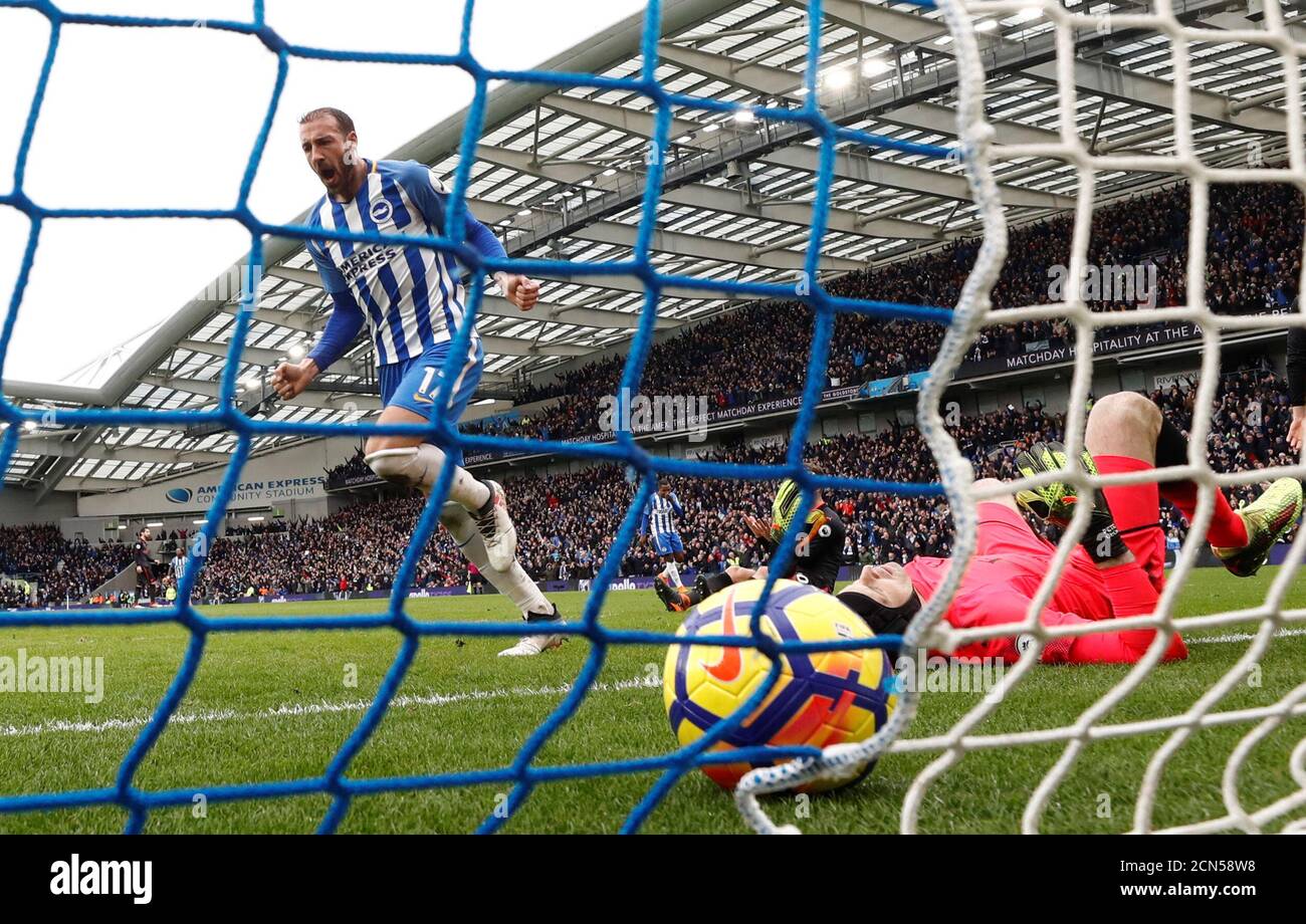 Soccer Football - Premier League - Brighton & Hove Albion vs Arsenal - The American Express Community Stadium, Brighton, Britain - March 4, 2018   Brighton's Glenn Murray celebrates scoring their second goal as Arsenal's Petr Cech looks dejected    REUTERS/Eddie Keogh    EDITORIAL USE ONLY. No use with unauthorized audio, video, data, fixture lists, club/league logos or 'live' services. Online in-match use limited to 75 images, no video emulation. No use in betting, games or single club/league/player publications.  Please contact your account representative for further details. Stock Photo
