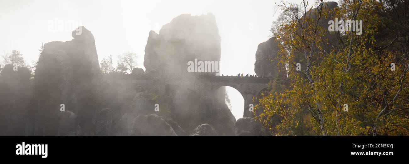 Fog over the Bastei bridge at the Elbe Sandstone mountain Stock Photo