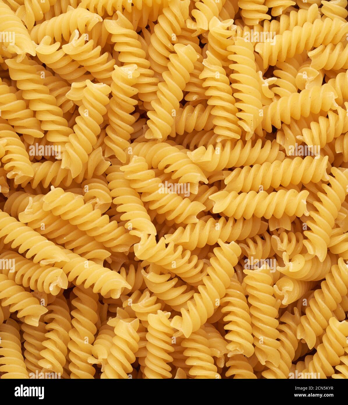 a bunch of raw fusilli pasta, top view, full frame Stock Photo Alamy