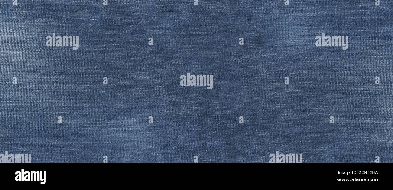 Old used blue denim texture banner Stock Photo