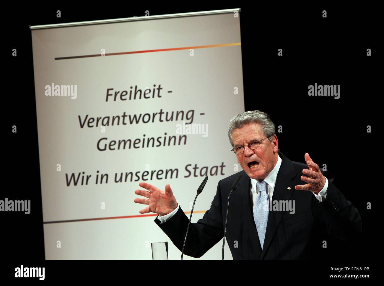 German presidential candidate Joachim Gauck delivers a speech in the Deutsches Theater (German Theatre) in Berlin, June 22, 2010. The vote for the largely ceremonial post is shaping up as a big test for Chancellor Angela Merkel who has been dogged by falling popularity, policy spats in her centre-right coalition and accusations of weak leadership. A failure by Merkel to push through the conservative candidate Christian Wulff, the premier of the state of Lower Saxony, would be widely viewed as a major defeat for her. Joachim Gauck, a former Protestant pastor who played an important role in the  Stock Photo