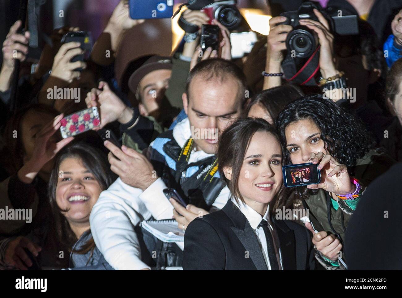 Actress Ellen Page arrives as she poses with fans on the red carpet for the film 'Freeheld' during the 40th Toronto International Film Festival in Toronto, Canada, September 13, 2015. TIFF runs from September 10-20.   REUTERS/Mark Blinch Stock Photo
