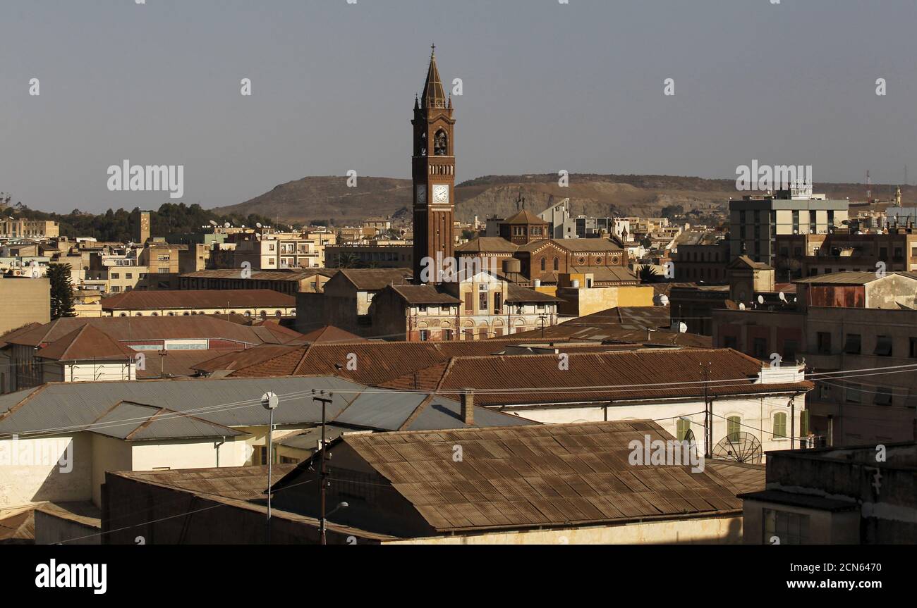 A 52-meter-high bell tower is seen at St. Joseph's Catholic Cathedral on Liberation Avenue in Eritrea's capital Asmara, February 19, 2016. Eritrea's capital city boasts one of the world's finest collections of early 20th century architecture, which the authorities want declared a UNESCO World Heritage Site. When Italy's colonial experiment in Eritrea ended in 1941, it left behind an array of Rationalist, Futurist, Art Deco and other styles of Modernism in Asmara, a city they nicknamed 'La Piccola Roma' or 'Little Rome'. REUTERS/Thomas Mukoya SEARCH 'THE WIDER IMAGE' FOR ALL STORIES Stock Photo