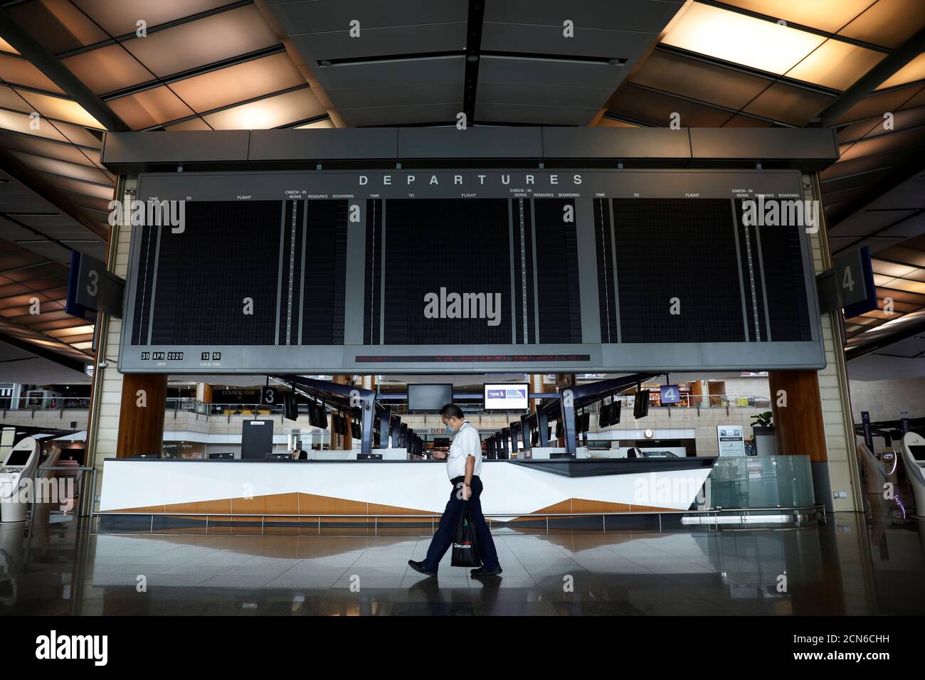 A view of an empty Changi Airport Terminal 2 a day before its 18-month closure due to the impact of the coronavirus disease (COVID-19) outbreak, in Singapore April 30, 2020. REUTERS/Edgar Su Stock Photo