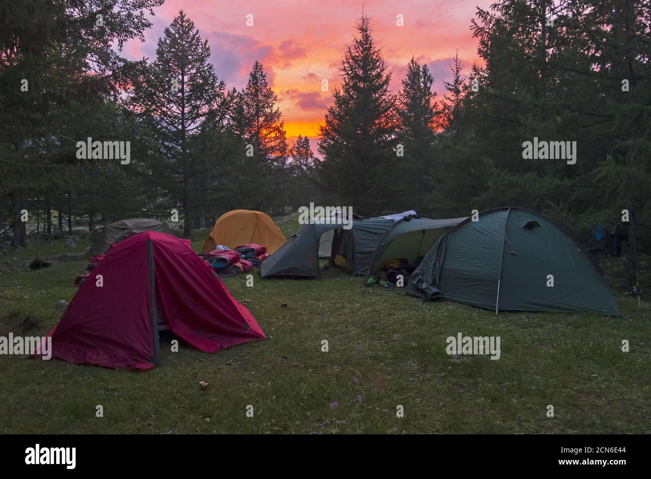 Tourist camp on a background of a beautiful sunset sky. Stock Photo
