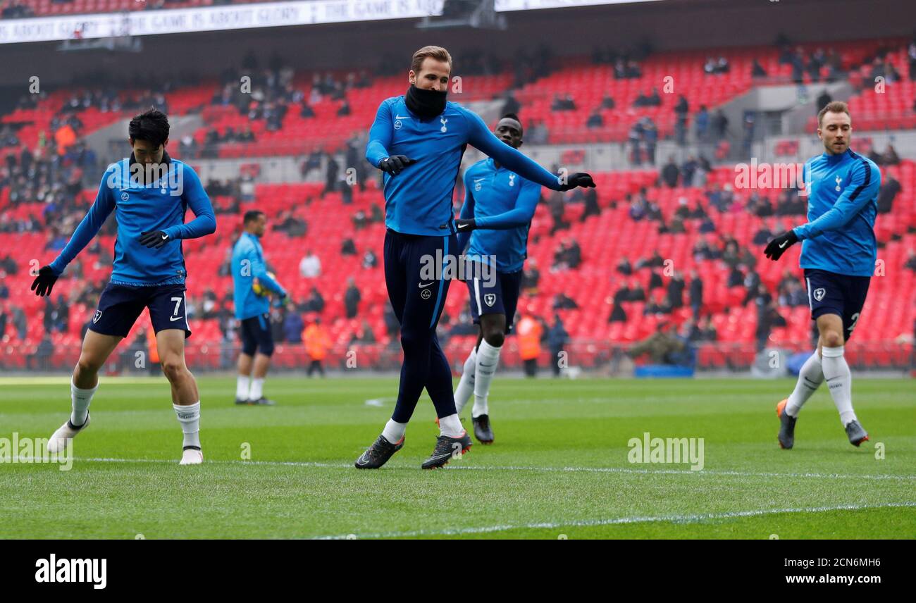 Soccer Football - Premier League - Tottenham Hotspur vs Huddersfield Town - Wembley Stadium, London, Britain - March 3, 2018   Tottenham's Harry Kane and team mates during the warm up before the match    REUTERS/Eddie Keogh    EDITORIAL USE ONLY. No use with unauthorized audio, video, data, fixture lists, club/league logos or 'live' services. Online in-match use limited to 75 images, no video emulation. No use in betting, games or single club/league/player publications.  Please contact your account representative for further details. Stock Photo