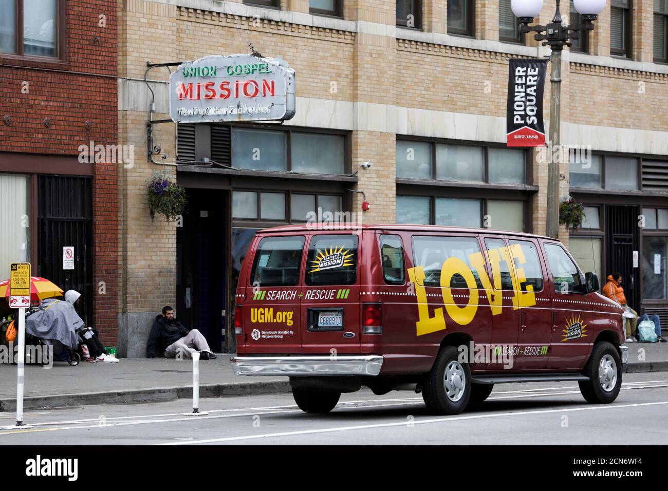 A van is pictured outside the Union Gospel Mission Men's Shelter in Pioneer Square, after a confirmed case of COVID-19 at their Riverton Place location led to a 14-day lockdown at all Mission Program sites, according to their website, as efforts continue to help slow the spread of coronavirus disease (COVID-19) in Seattle, Washington, U.S. March 28, 2020.  REUTERS/Jason Redmond Stock Photo