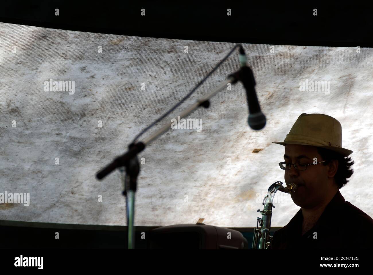 Saxophone player with microphone at the Calgary Jazz Festival Canada Stock Photo