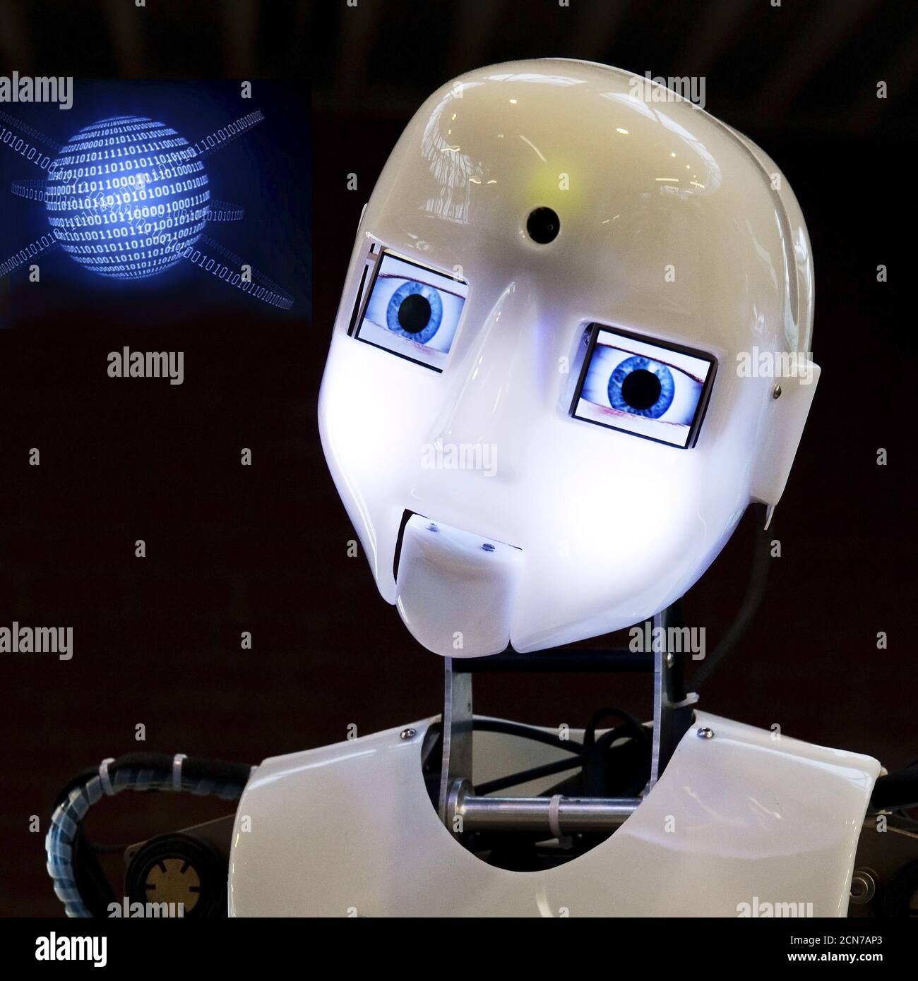 Photomontage, the humanoid robot RoboThespian with a digital earth from the numbers zero and one Stock Photo