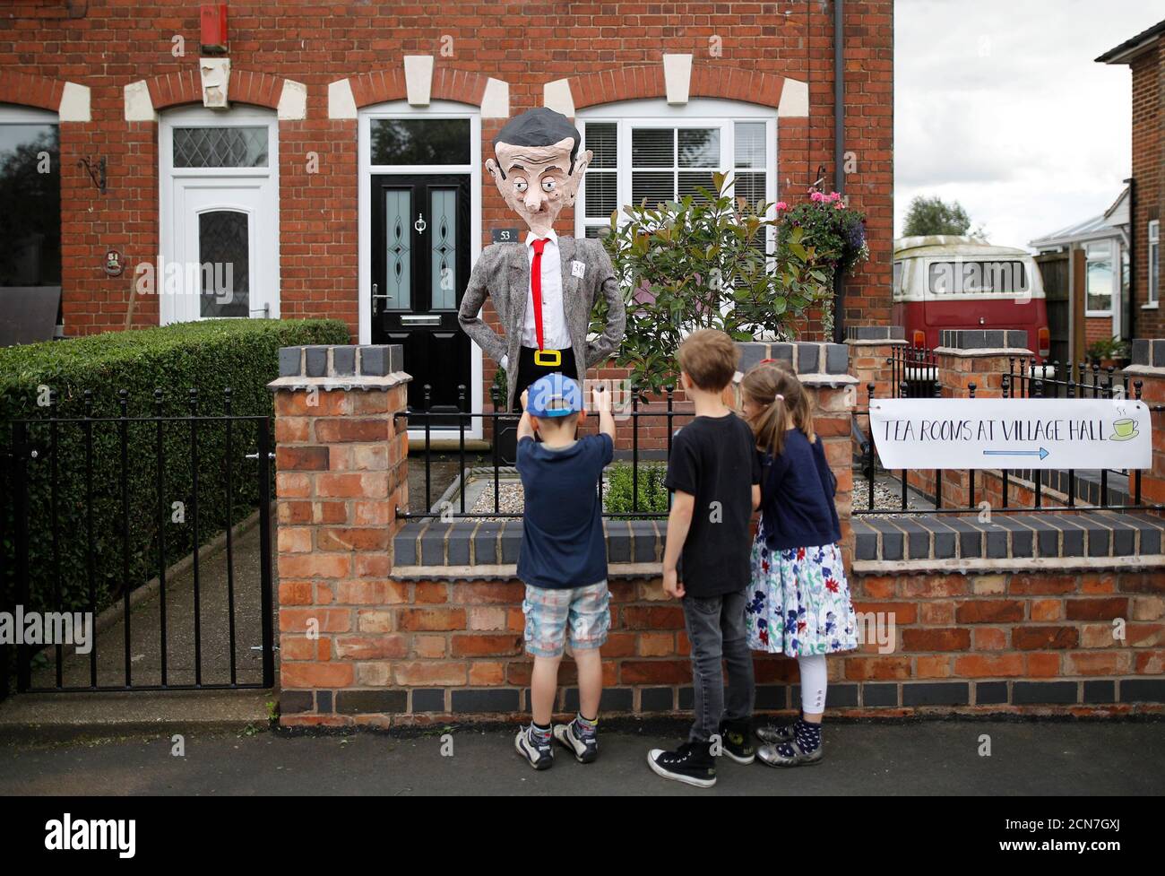Children Look At A Scarecrow Depicting The Film Character Mr Bean During The Scarecrow Festival In Heather Britain July 31 16 During The Annual Event Residents Of Heather Are Asked To Make