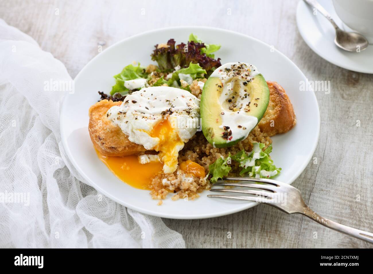 A healthy and balanced breakfast plate. Benedict's egg spreads on a