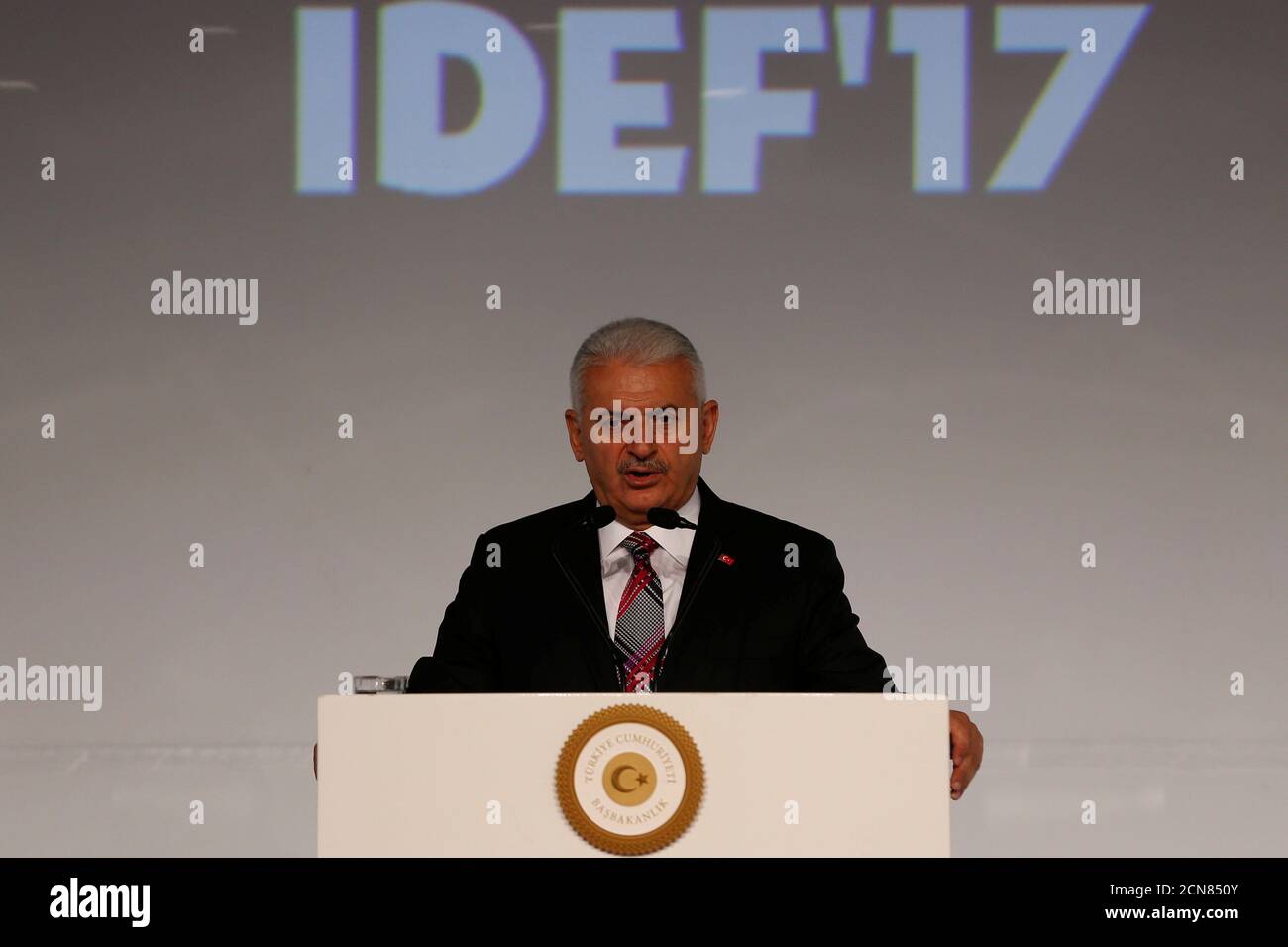 Turkish Prime Minister Binali Yildirim speaks during the opening ceremony of IDEFÕ17, the 13th International Defence Industry Fair, in Istanbul, Turkey, May 9, 2017. REUTERS/Murad Sezer Stock Photo