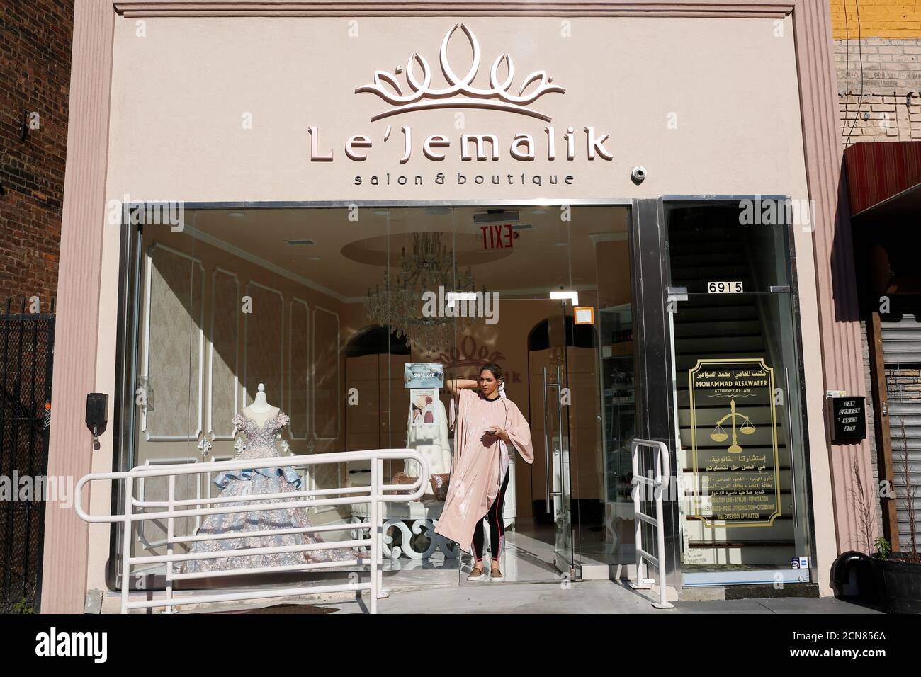 Farah Ibrahim, a 25 year old Palestinian American Muslim, stands outside  Le'Jemalik Salon and Boutique after getting her hair dyed ahead of the Eid  al-Fitr Islamic holiday in Brooklyn, New York, U.S.,