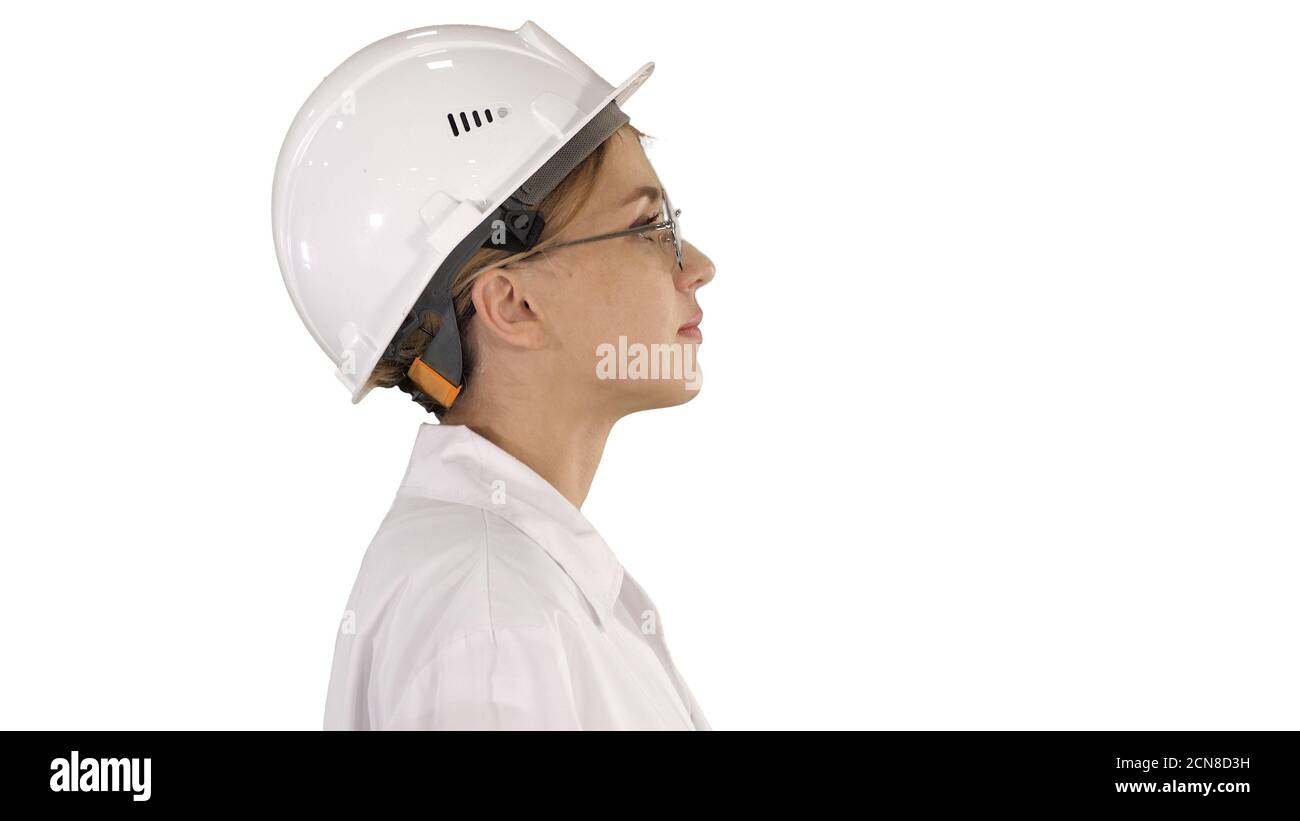 Female scientist walking on white background. Stock Photo