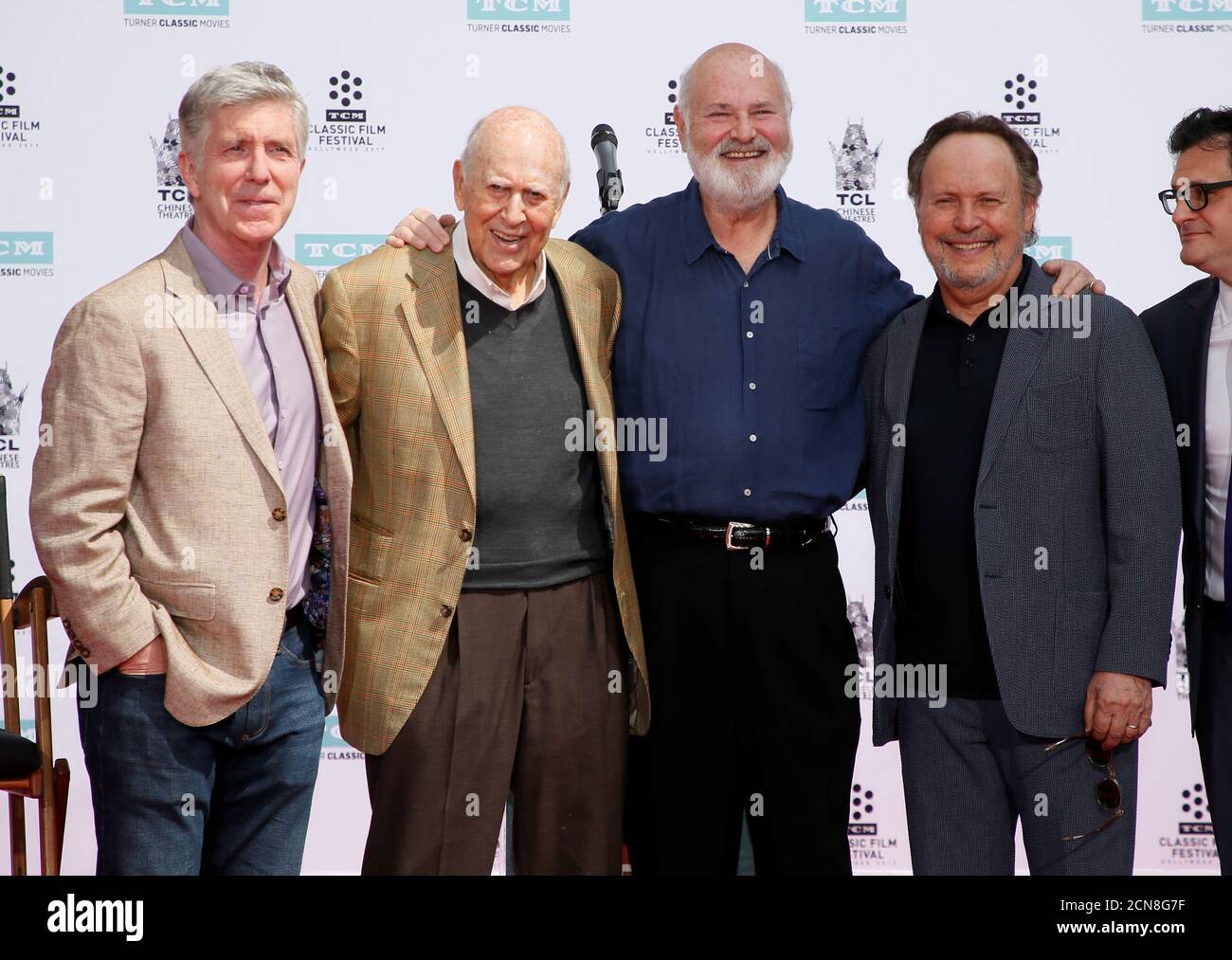 From left to right, television personality Tom Bergeron, Actors, directors  and producers Carl Reiner and son Rob Reiner and actor Billy Crystal pose  during the Reiner's Hand and Footprint Ceremony presented as