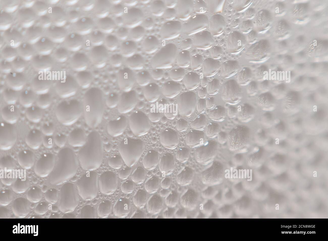 Water drops on the bottles.Water drop background. Macro view. Stock Photo