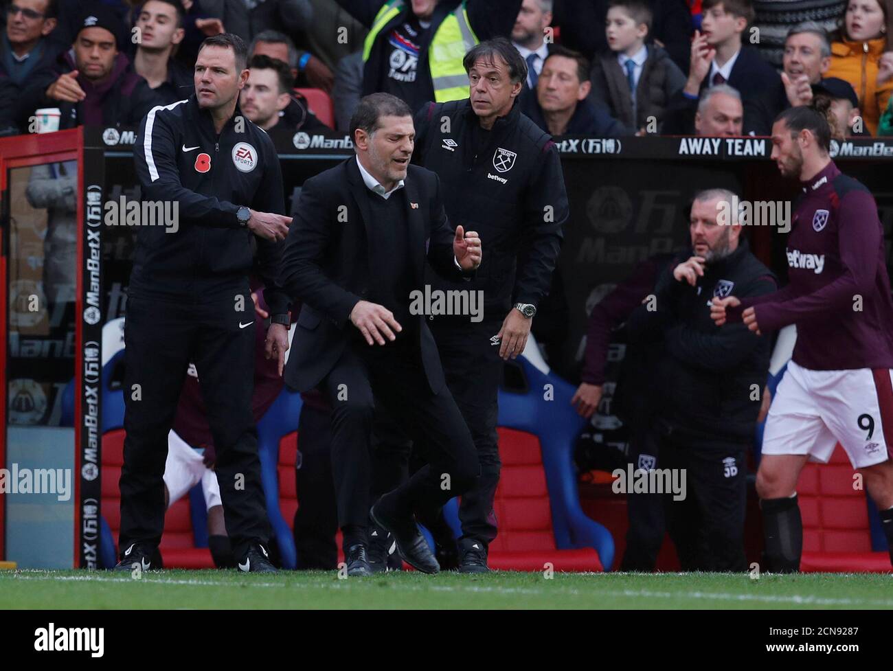 Soccer Football - Premier League - Crystal Palace vs West Ham United - Selhurst Park, London, Britain - October 28, 2017   West Ham United manager Slaven Bilic looks dejected as Crystal Palace celebrate their second goal   REUTERS/Eddie Keogh    EDITORIAL USE ONLY. No use with unauthorized audio, video, data, fixture lists, club/league logos or 'live' services. Online in-match use limited to 75 images, no video emulation. No use in betting, games or single club/league/player publications. Please contact your account representative for further details.? Stock Photo