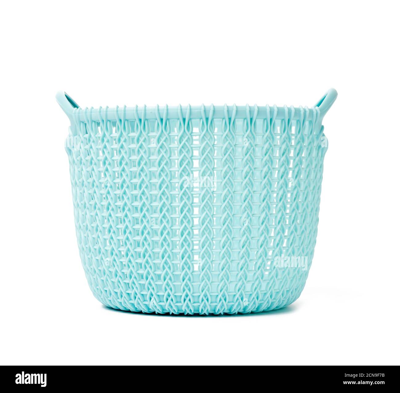 round blue laundry basket at home isolated on white background Stock