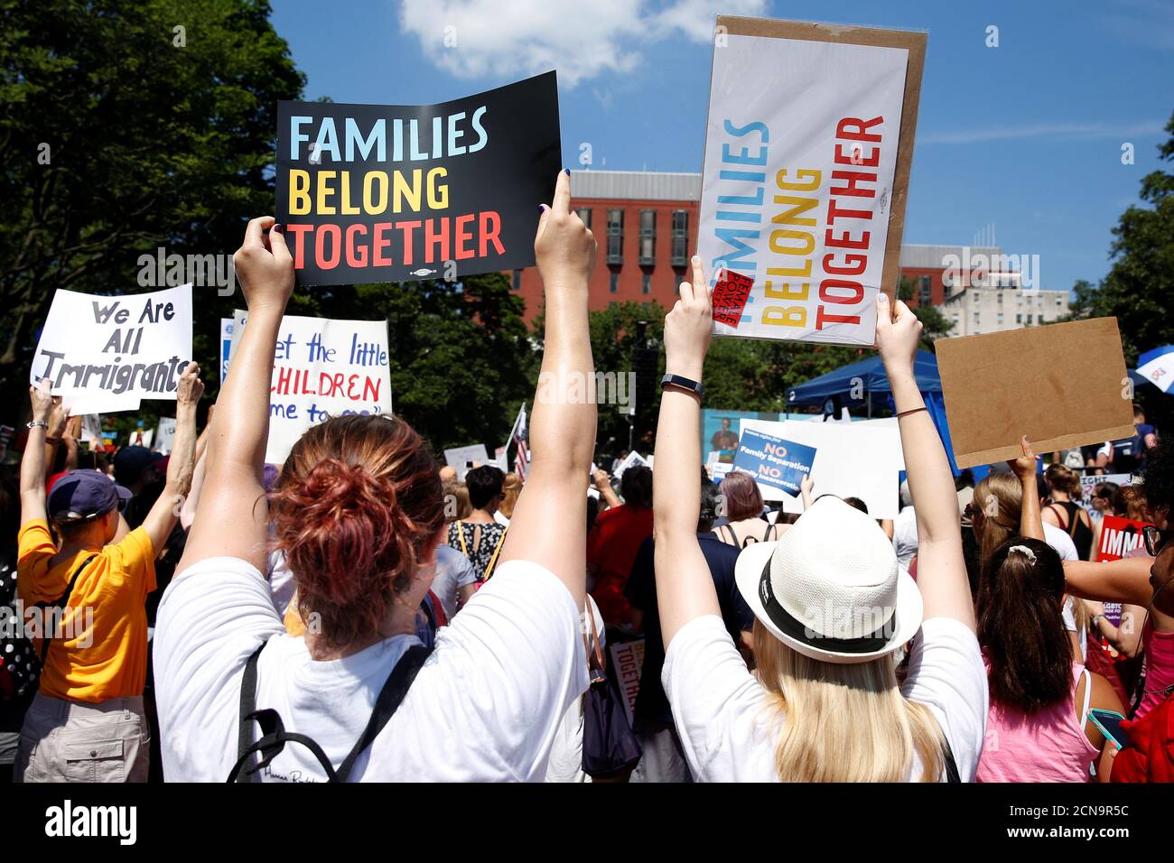 Immigration activists hold signs against family separation during a rally to protest against the Trump Administration's immigration policy outside the White House in Washington, U.S., June 30, 2018. REUTERS/Joshua Roberts Stock Photo