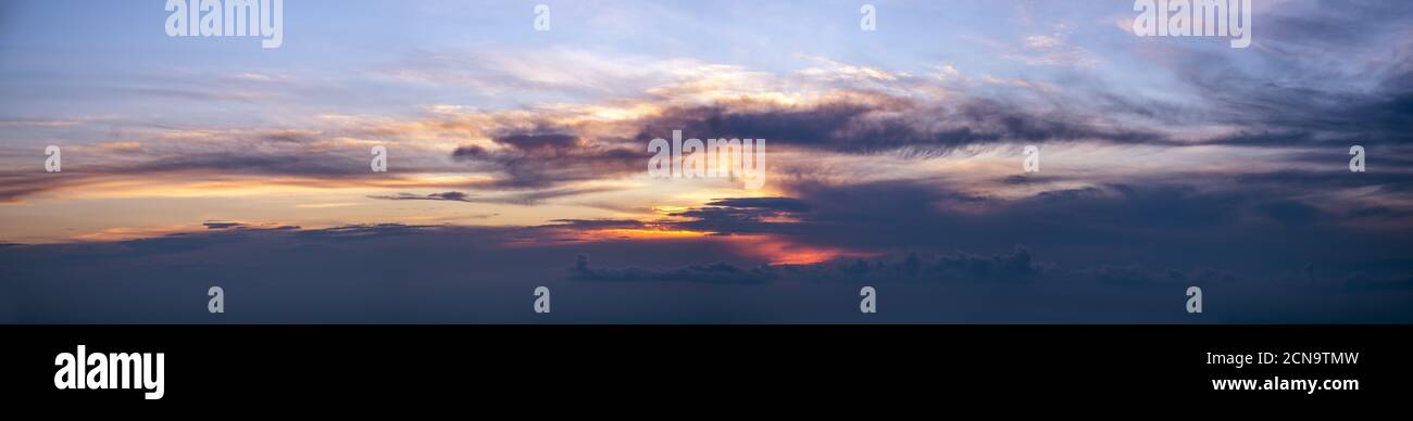 Sunset sky with clouds panorama Stock Photo - Alamy